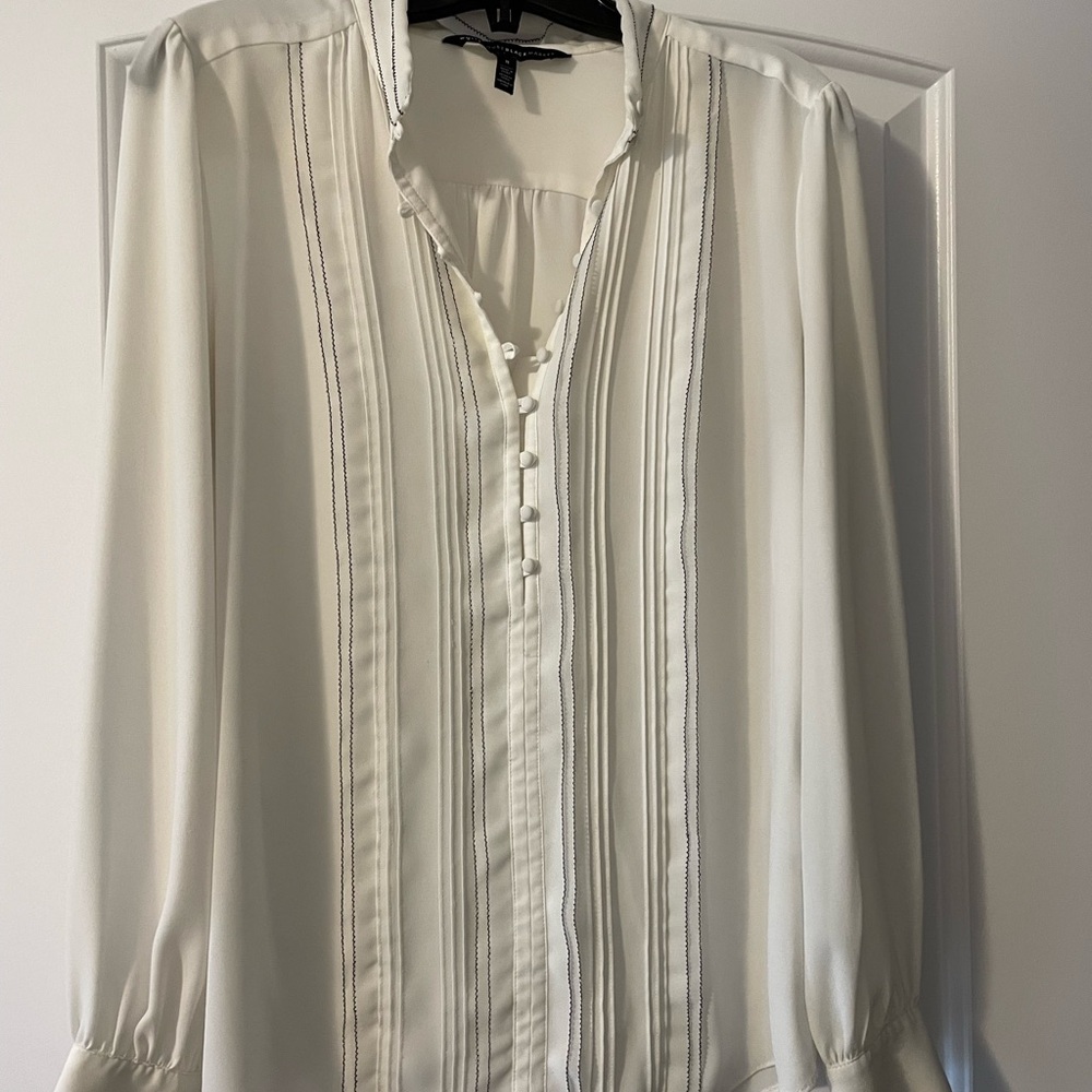 8$ ADD ON! Elegant White Blouse with Button Detail